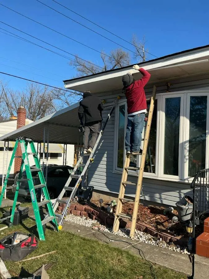Restoration crew performing exterior repair in Westbury